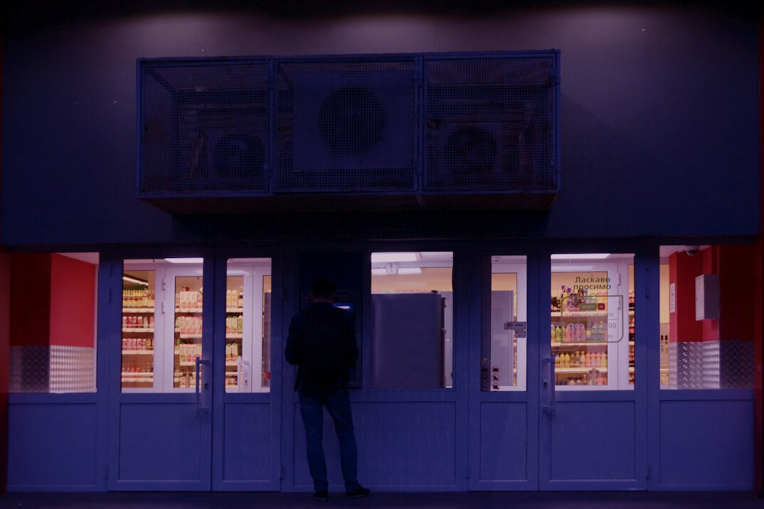 store detective watching customer