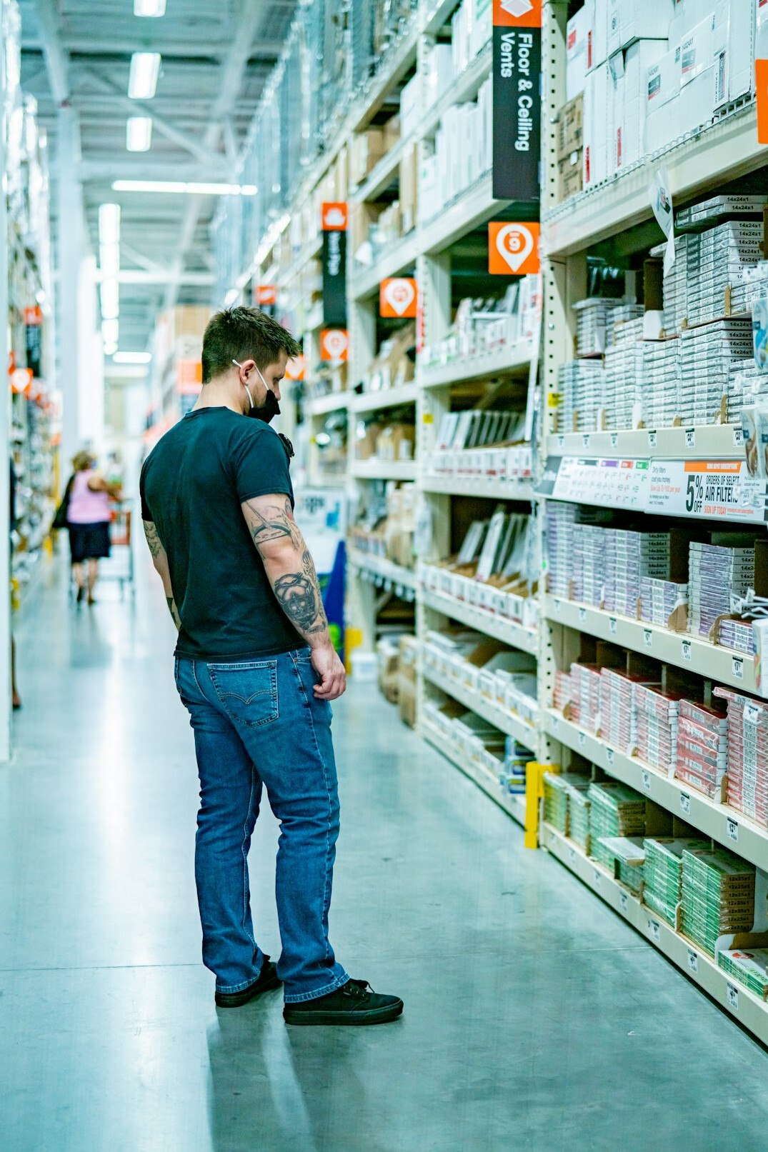 store detective watching customer